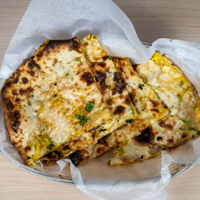 Aloo (Potato) Naan or Gobi (Cauliflower) Naan.